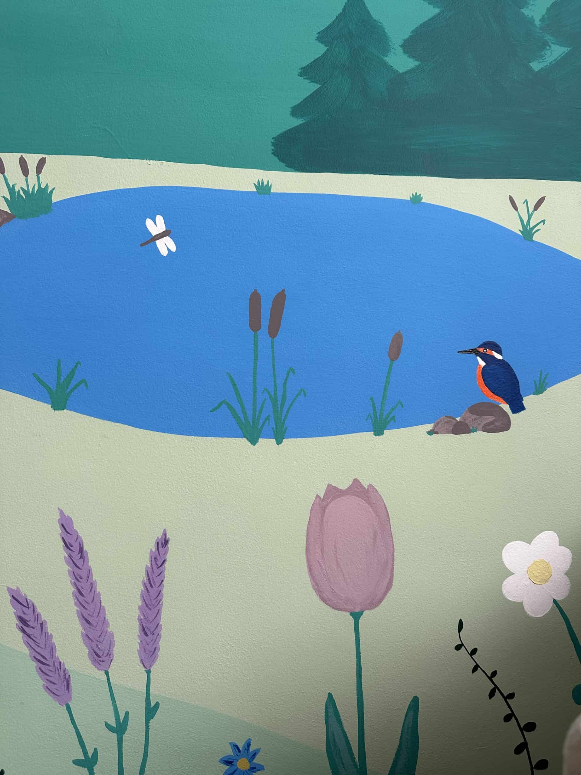 Colorful illustration of a pond with a kingfisher bird and surrounding plants.
